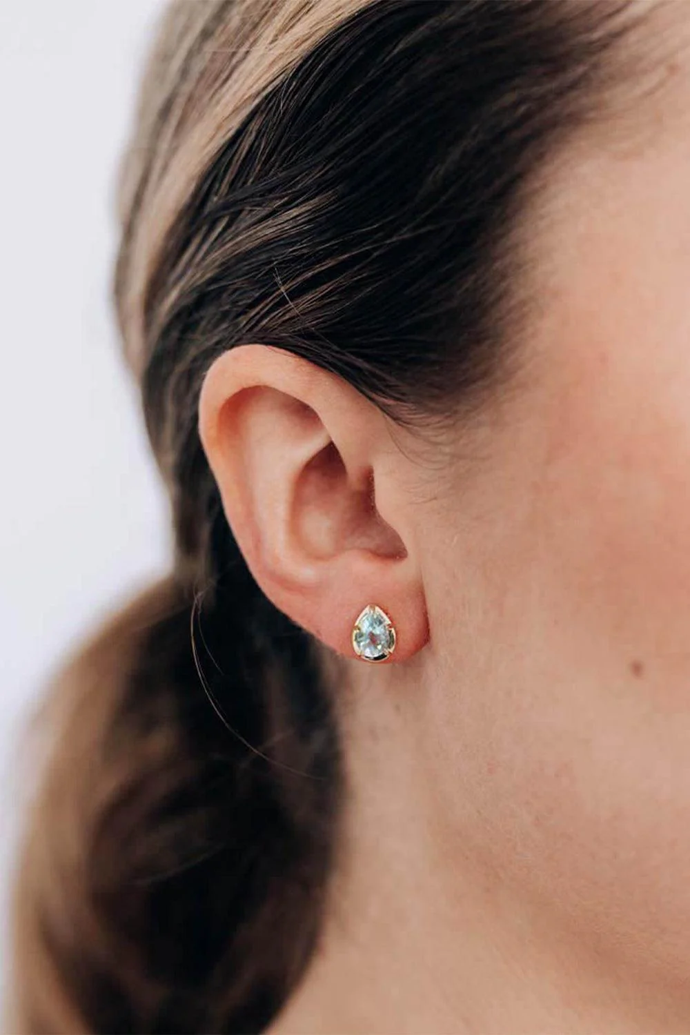 Clear Topaz Mélia Pear Stud Earrings - Image 2