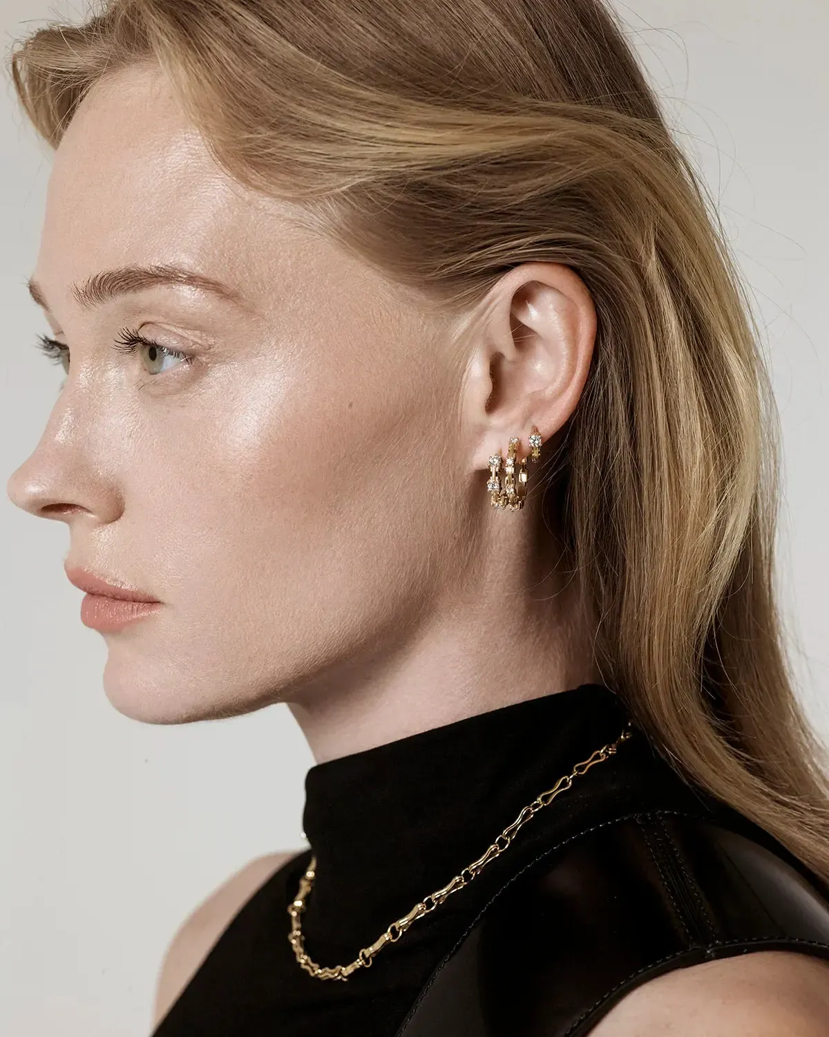 Large Pirouette Diamond Huggie Earrings - Image 2