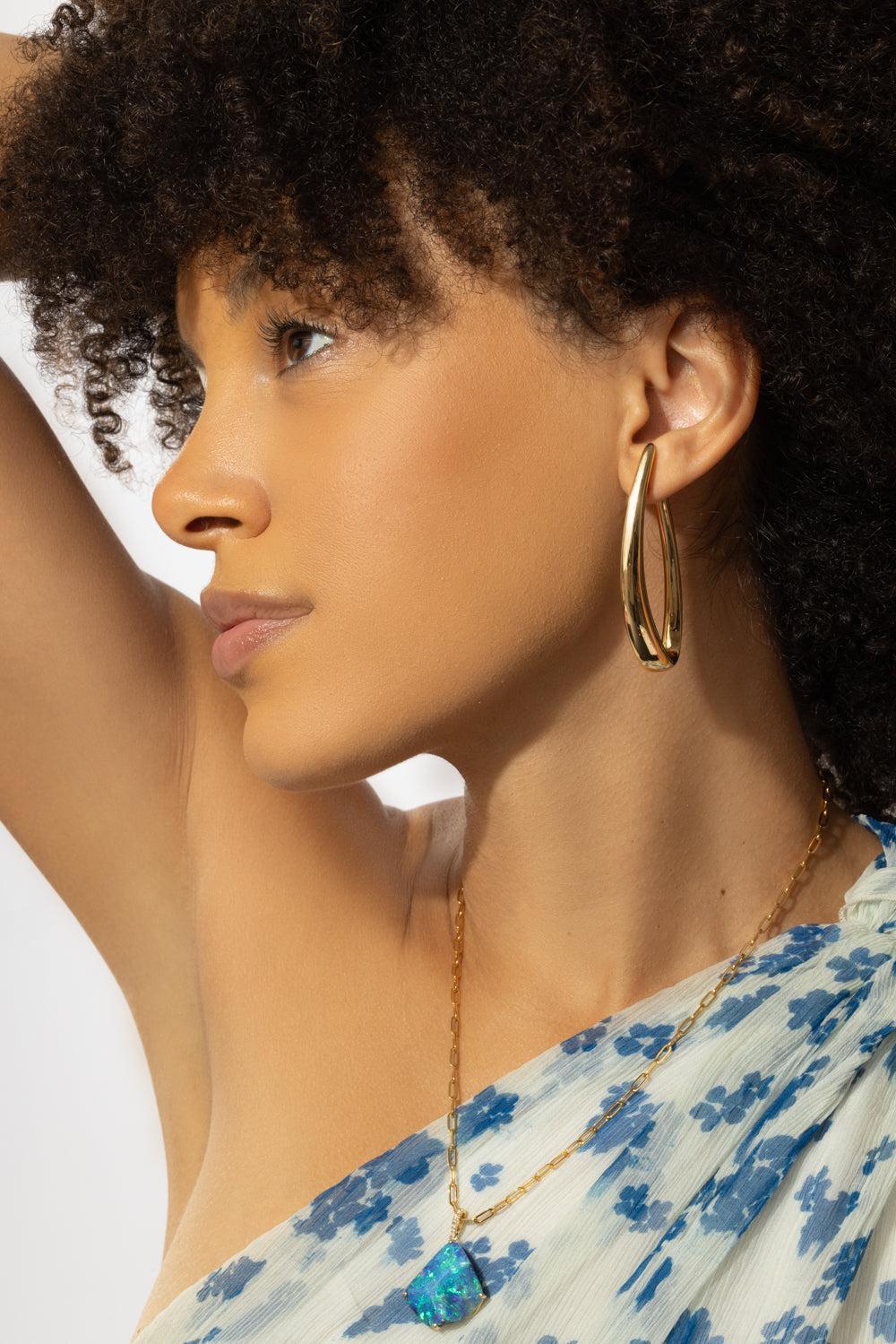 Elongated Curved Hoop Earrings - Image 2