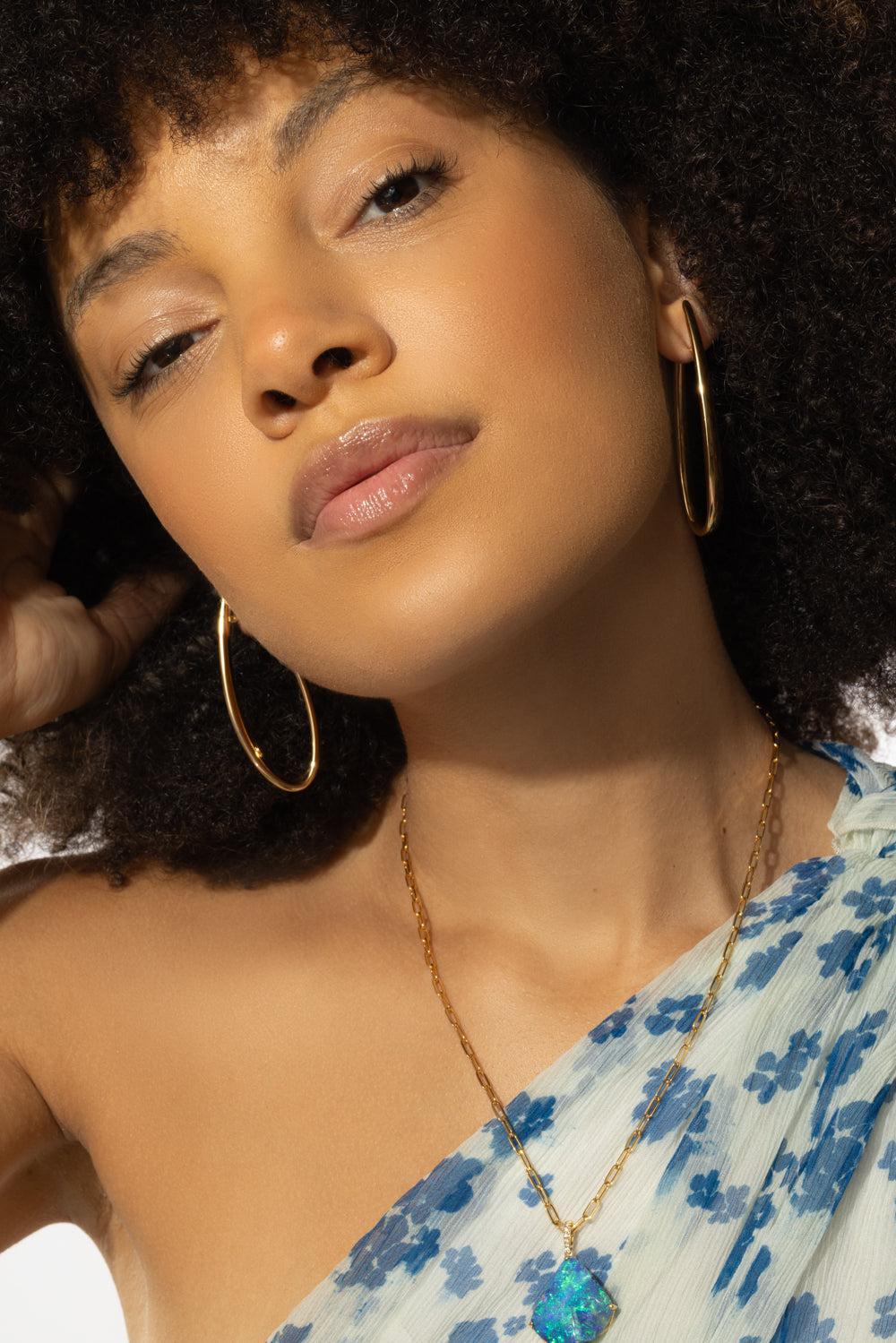 Elongated Curved Hoop Earrings - Image 3
