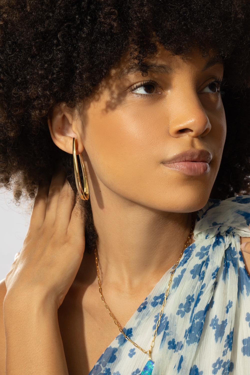 Elongated Curved Hoop Earrings - Image 4
