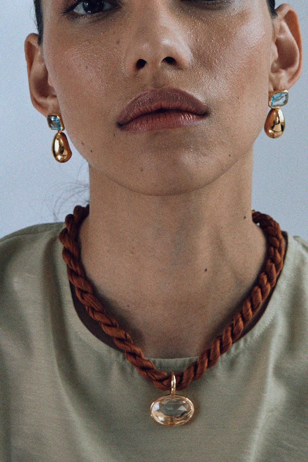 Blue Topaz Bean Earrings - Image 2