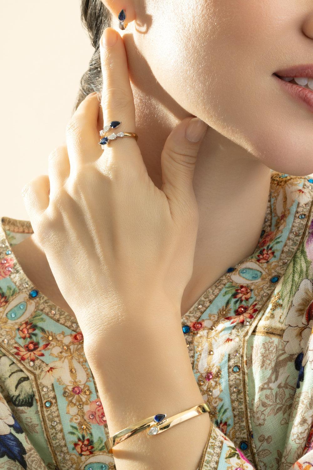 Blue Sapphire Diamond Crossover Ring - Image 3